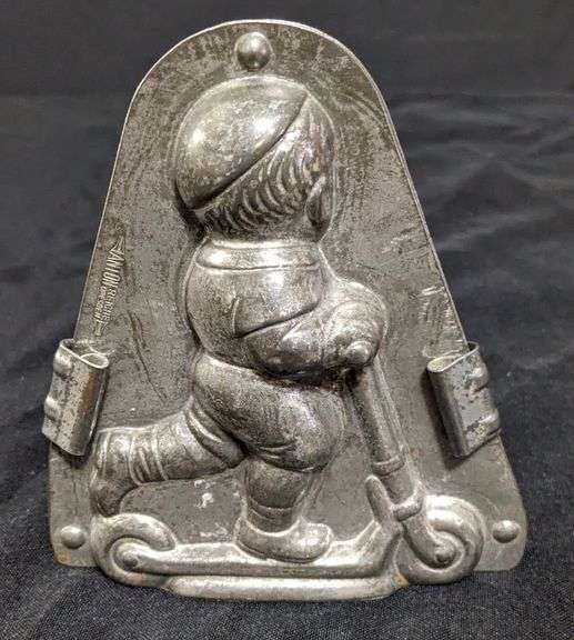 ANTIQUE CHOCOLATE MOLD BOY CHILD ON SCOOTER ANTON REICHE DRESDEN