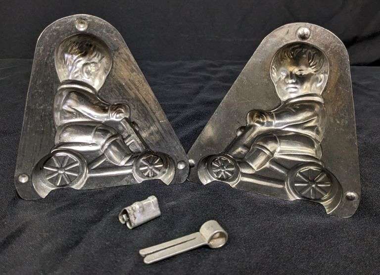 ANTIQUE CHOCOLATE MOLD BOY CHILD ON WHEELED VEHICLE ANTON REICHE DRESDEN