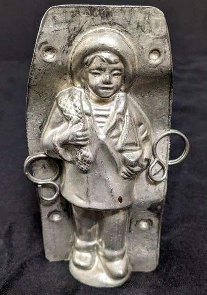ANTIQUE CHOCOLATE MOLD BOY WITH BLANKET & TOY SAILBOAT