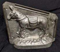 ANTIQUE CHOCOLATE MOLD MEXICAN PACK DONKEY
