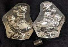 ANTIQUE CHOCOLATE MOLD EASTER BOY RIDING CHICK BLOWING TRUMPET ANTON REICHE DRESDEN