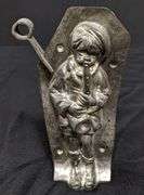 ANTIQUE CHOCOLATE MOLD BOY PLAYING HORN INSTRUMENT