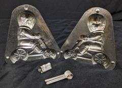 ANTIQUE CHOCOLATE MOLD BOY CHILD ON WHEELED VEHICLE ANTON REICHE DRESDEN