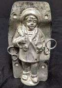 ANTIQUE CHOCOLATE MOLD BOY WITH BLANKET & TOY SAILBOAT