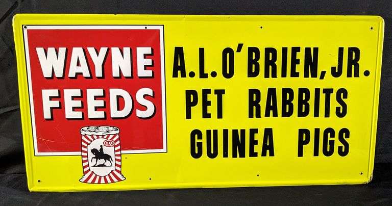 TIN SIGN WAYNE FEEDS PET RABBITS & GUINEA PIGS