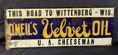 EMBOSSED TIN SIGN ONAEIL'S VELVET OIL THIS ROAD TO WITTENBERG WIS