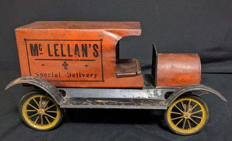 LARGE TIN TOY DELIVERY TRUCK MC LELLAN'S SPECIAL DELIVERY PULL TOY