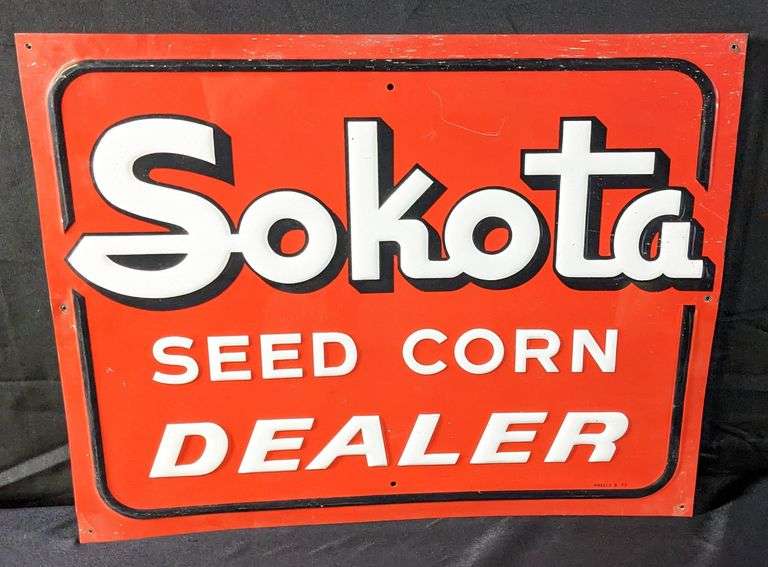 EMBOSSED TIN SIGN SOKOTA SEED CORN DEALER (SOUTH DAKOTA)