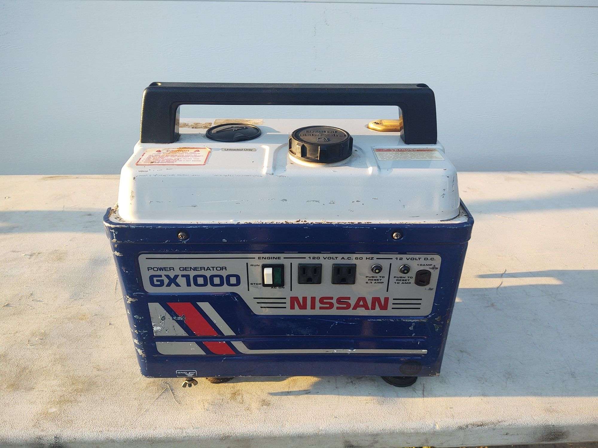 1000W Nissan Generator - McLaughlin Auctioneers, LLC- mc-bid.com