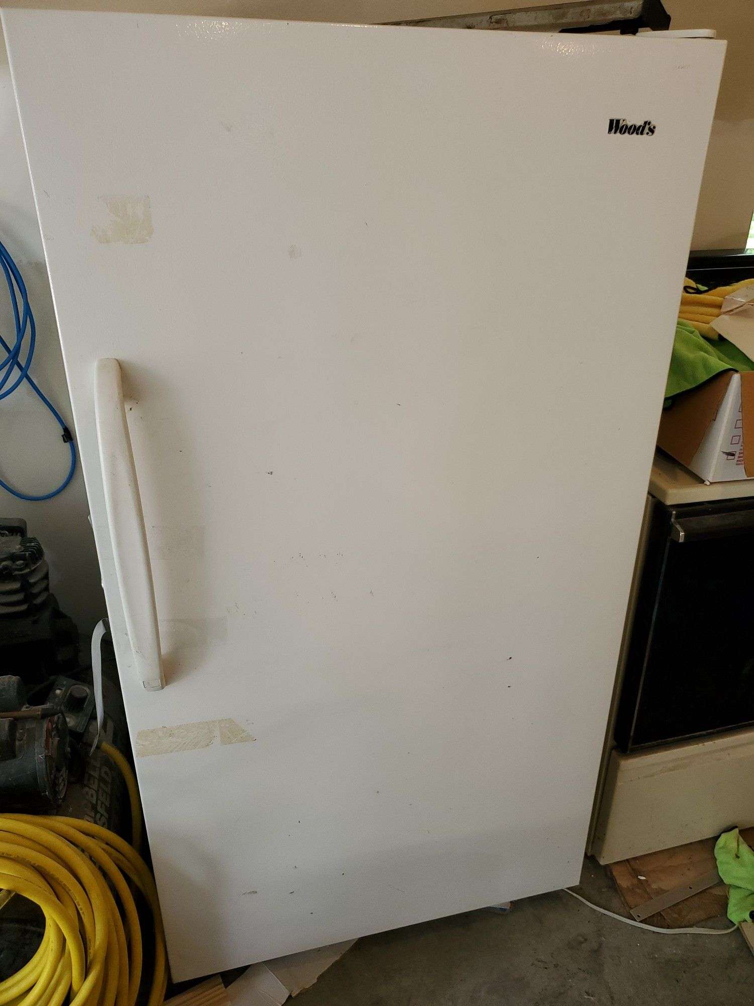 Woods upright freezer - McLaughlin Auctioneers, LLC- mc-bid.com