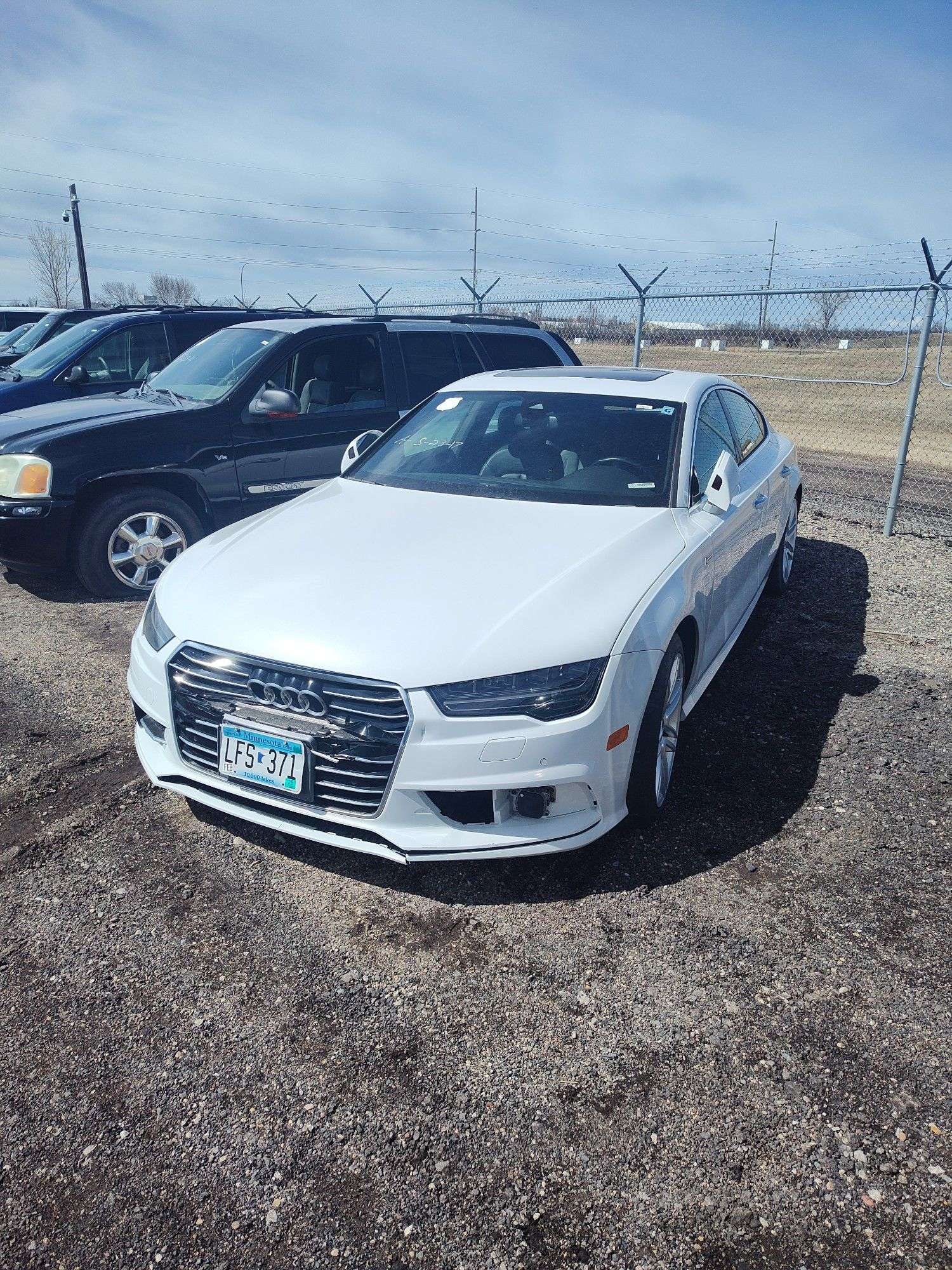 2016 Audi A7 WAUWGAFC7GN089623 - McLaughlin Auctioneers, LLC- mc-bid.com