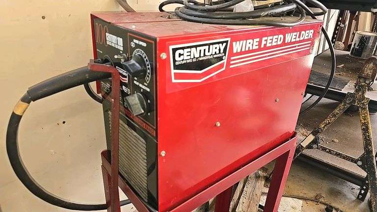 Century 90 Amp Wire Feed Welder, 120V, Includes Cables and cart