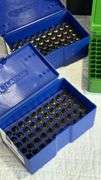 Brass Parts in Green & Blue Plastic Storage Boxes with Hunter Case