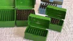 Brass Parts in Green & Blue Plastic Storage Boxes with Hunter Case