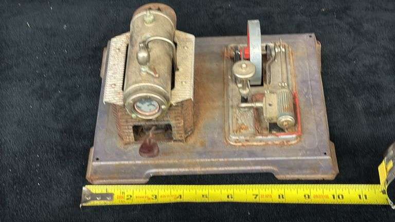 Vintage Model Steam Engine with Red Flywheel and Boiler