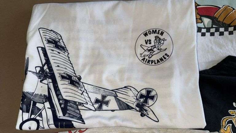 Vintage New or Lightly Used T-Shirt Collection with Unique Graphic Prints, Including Speed Racer & T