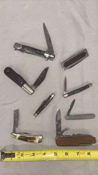 Collection of Assorted Pocket Knives with Multi-Blade Designs