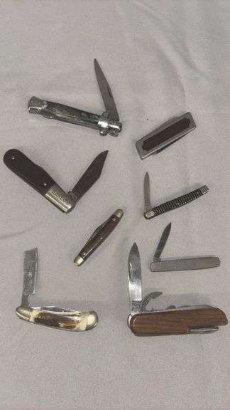 Collection of Assorted Pocket Knives with Multi-Blade Designs