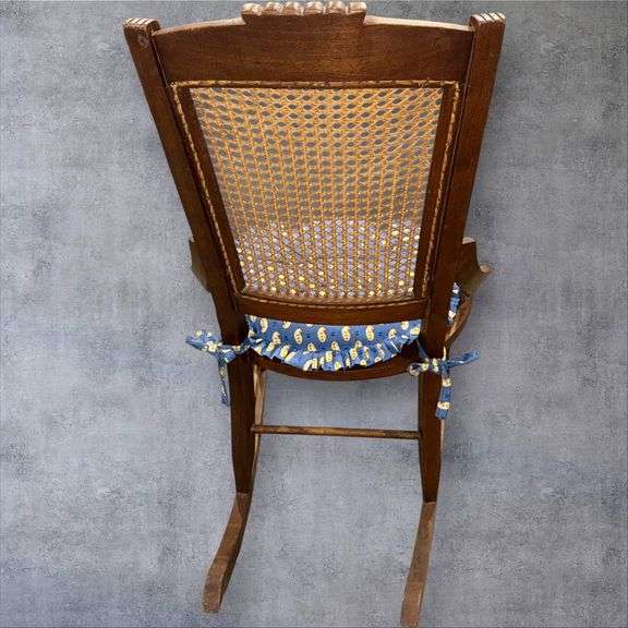 Traditional Wooden Rocking Chair with Cane Seat and Blue Cushion