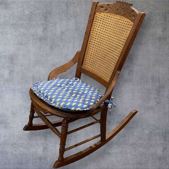Traditional Wooden Rocking Chair with Cane Seat and Blue Cushion