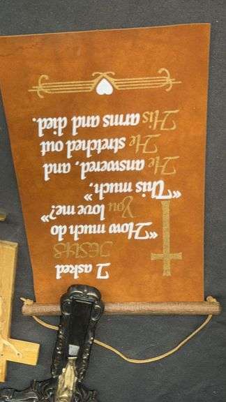 Religious Wall DÃ©cor Collection with Crucifixes and Scrolls