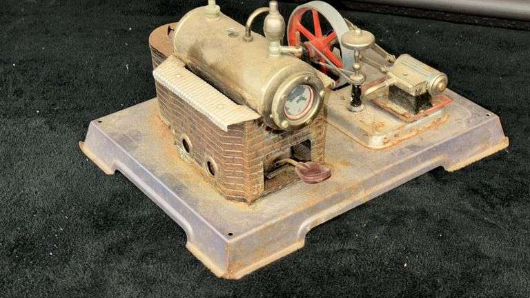 Vintage Model Steam Engine with Red Flywheel and Boiler