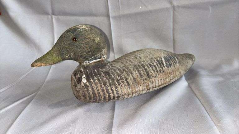 Vintage Hand-Carved Wooden Duck Decoy with Metal Keel