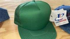 Variety of  New or Lightly Used Trucker Hats with NRA, Caterpillar, and WordPerfect Designs