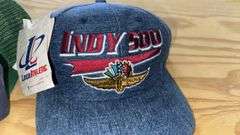 Variety of  New or Lightly Used Trucker Hats with NRA, Caterpillar, and WordPerfect Designs