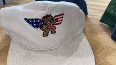 Variety of  New or Lightly Used Trucker Hats with NRA, Caterpillar, and WordPerfect Designs