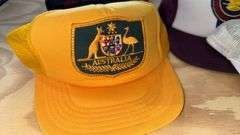 Variety of  New or Lightly Used Trucker Hats with NRA, Caterpillar, and WordPerfect Designs