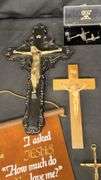 Religious Wall DÃ©cor Collection with Crucifixes and Scrolls
