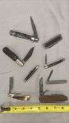 Collection of Assorted Pocket Knives with Multi-Blade Designs