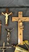 Religious Wall DÃ©cor Collection with Crucifixes and Scrolls