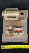 Vintage Model Steam Engine with Red Flywheel and Boiler