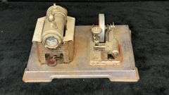 Vintage Model Steam Engine with Red Flywheel and Boiler