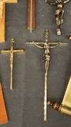 Religious Wall DÃ©cor Collection with Crucifixes and Scrolls