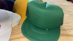 Variety of  New or Lightly Used Trucker Hats with NRA, Caterpillar, and WordPerfect Designs