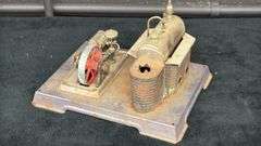Vintage Model Steam Engine with Red Flywheel and Boiler