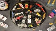 Hot Wheels Super Rally Case by Mattel with Die-Cast Cars, Trophy, Belt Buckle