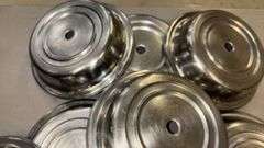Large Group of Stainless Plate Covers