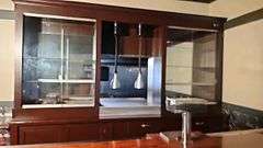Large Wooden Back Bar Cabinet with Glass Display and Storage