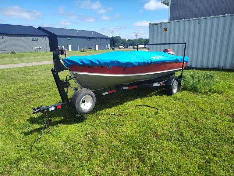 1971 14' Lund Fishing Boat with 10hp Johnson Motor, and Trailer.