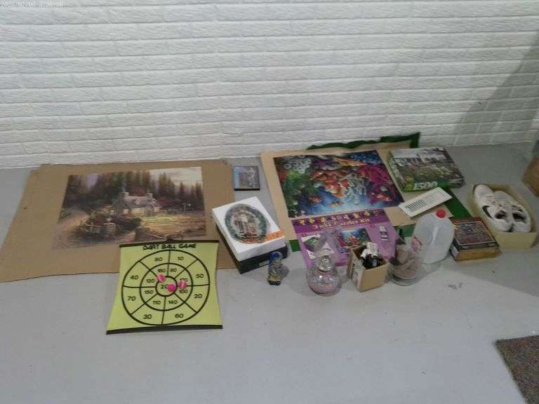 Puzzles, decorative Santa, oil lamp,used Nike tennis shoes, craft supplies. Located in basement.