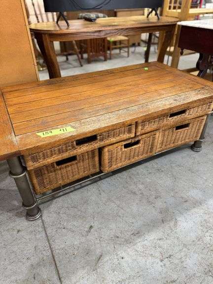 159 -11 coffee table with 6 baskets below. Top is 48"x26"