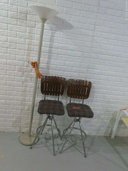 2 barstools & 1 floor lamp. Located in basement.