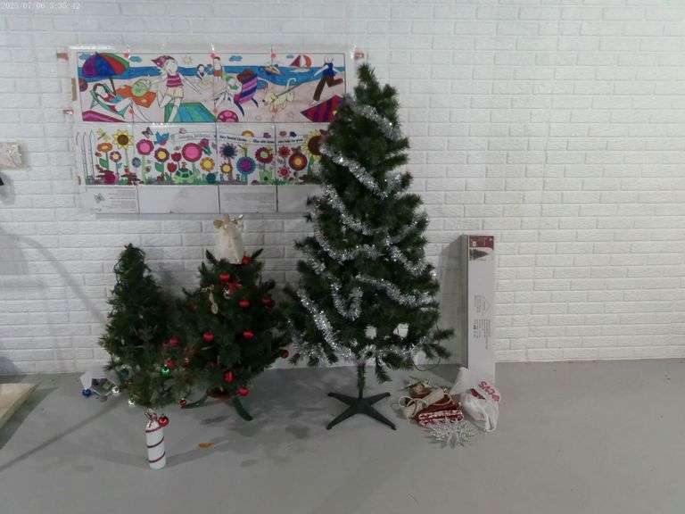 4 Christmas trees, various Christmas decor. Located in basement.