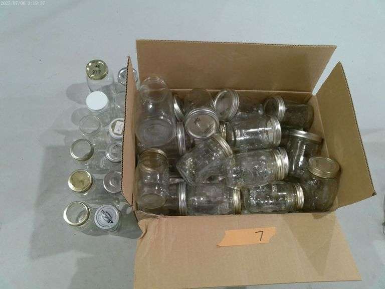 Large lot of canning jars with some lids and rings. Located in basement.