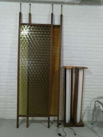 2 plastic room dividers and 2 shop lights. Dividers measure approximately 27 inches wide x 8 feet ta