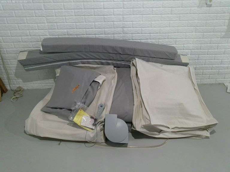 Bed frame, rails, air mattress size unknown. Located in basement.